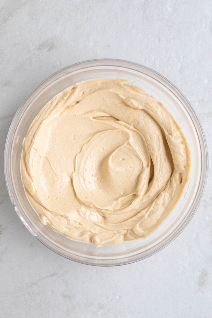 Glass bowl with peanut butter Greek yogurt mixture.