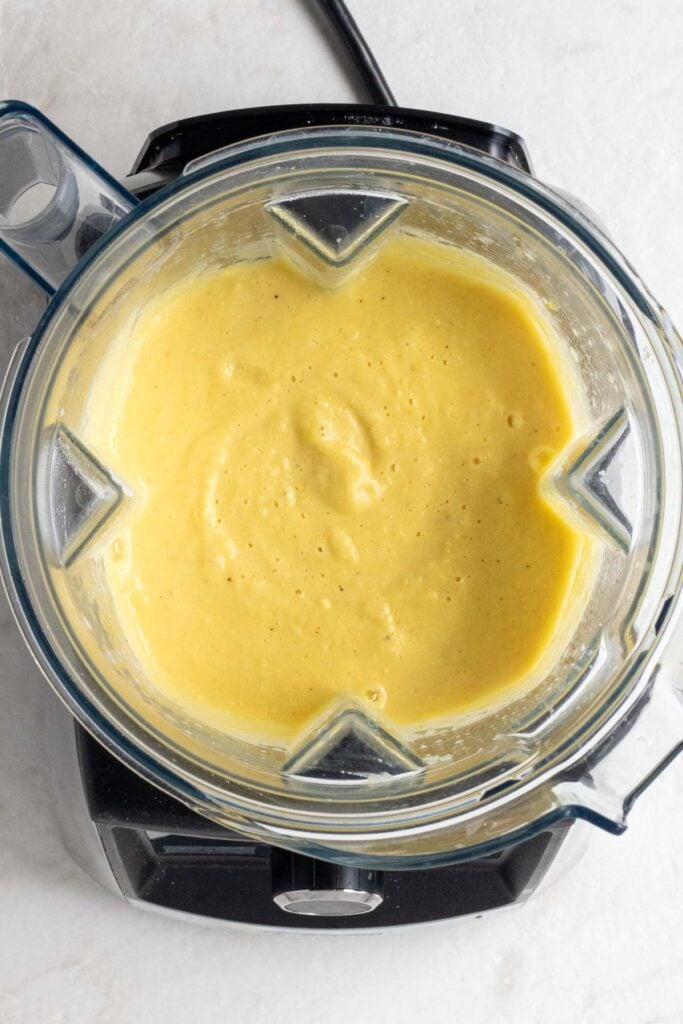 Blender of creamy corn pasta sauce.